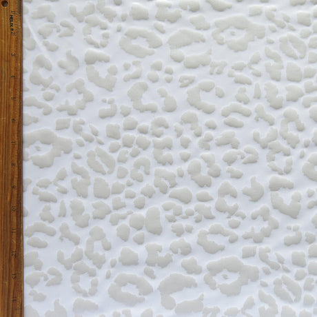 Athletic Jersey Knit White Leopard Foil Poly Spandex Fabric