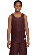 Black and White youth reversible mesh tank for basketball and team sports