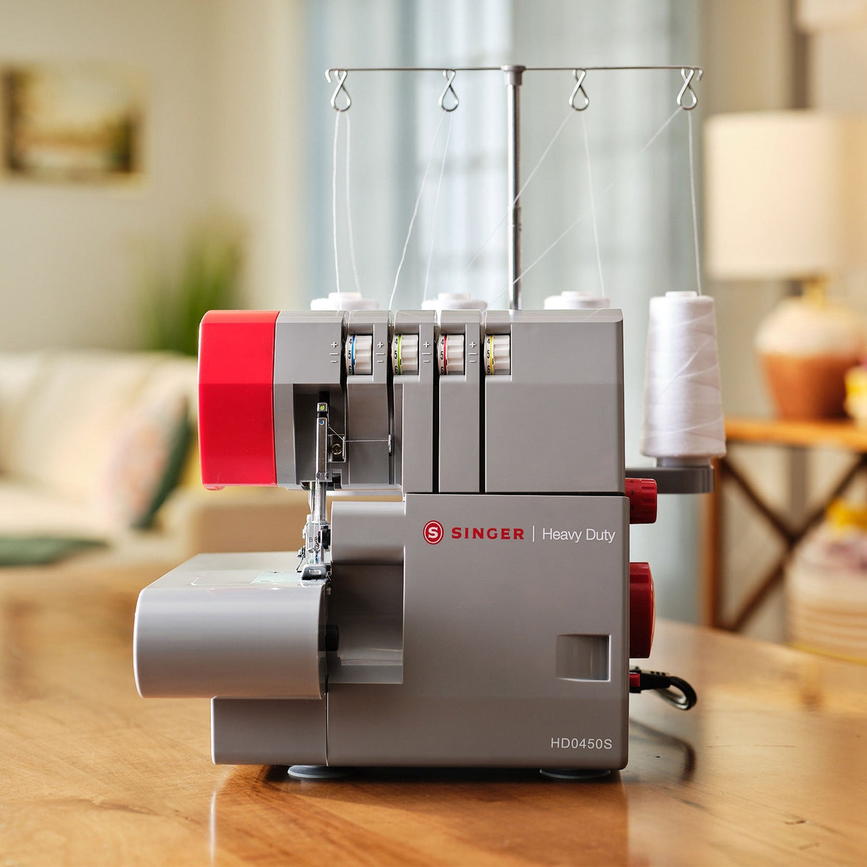 SINGER HD0450S Heavy Duty Serger - Heavy Duty Metal Frame, Stainless Steel Bed Plate, 14" X 11" X 11.5" Dimensions (1 Unit)