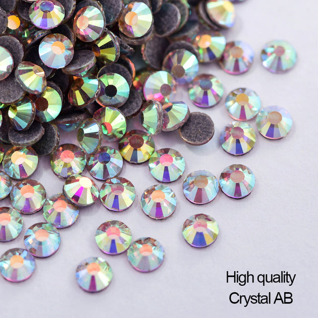 Small Bag Hot Fix Rhinestones - Clear AB Hot Fix Rhinestones Fabric - Clear AB, SS6 / 2MM, SS10 / 3MM, SS16 / 4MM, SS20 / 5MM, SS30 / 6MM (Small Bag)