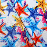 Coral Reef Polyester Spandex Fabric - Multi Star/Coral Print, 58/60" Width (1 Yard)