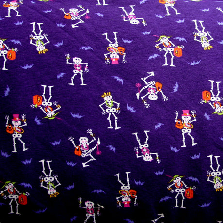 Cotton Lycra Knit Fabric Dancing Skeletons Purple