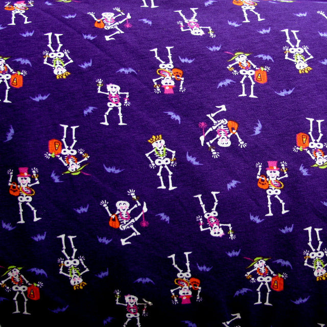 Cotton Lycra Knit Fabric Dancing Skeletons Purple