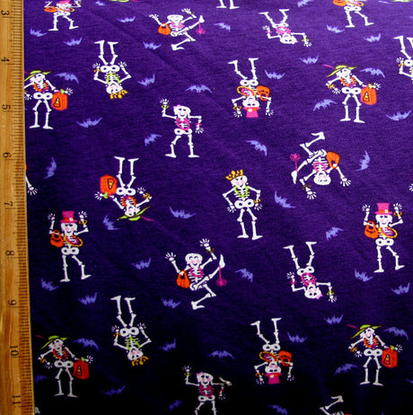Cotton Lycra Knit Fabric Dancing Skeletons Purple