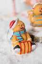 4” Resin Sledding Gingerbread Man Ornament