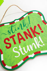 11" x 9" Red White Green Glitter Sign - "Stink! Stank! Stunk!"