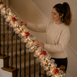 Pre-Lit Snowy Bristle Pine Garland with Clear Lights and Ornaments, 9 Foot (Plug-In)