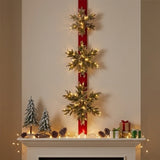 Pre-Lit 70 in. Glittery Bristle Pine Triple Snowflake Hanging Christmas Door Decoration with Warm White LED Lights & Timer
