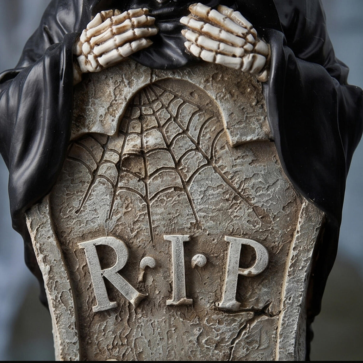12 in. Halloween Skeleton Behind a Tombstone Decoration