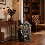 12 in. Halloween Skeleton Holding a Tombstone Decoration