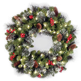 Pre-Lit 24 in. Crestwood Spruce Christmas Wreath with Warm White LED Lights, Battery Operated Timer Door Decoration