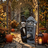 12 in. Halloween Skeleton Holding a Tombstone Decoration