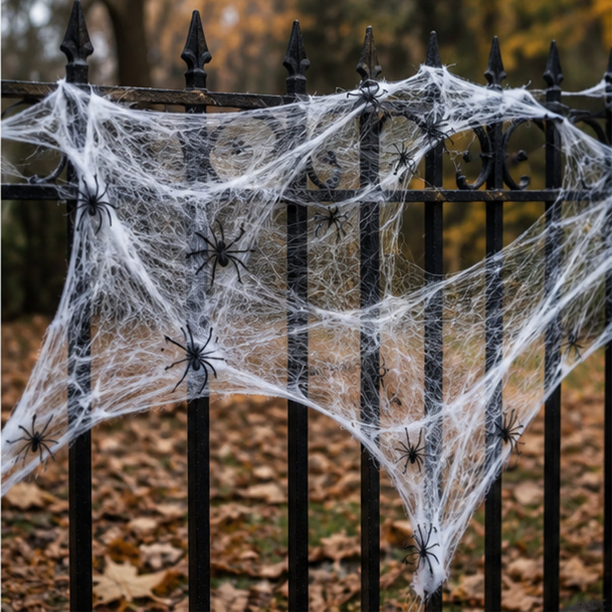 Stretchable Spider Web Halloween Decorations with Spiders – 12 Pc.