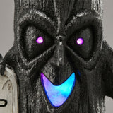 15 in. Halloween Tree Holding Skull and RIP Tombstone with LED Lights