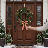 Pre-Lit Crestwood Spruce Wreath with Clear Lights, 24 Inch (Plug-In)