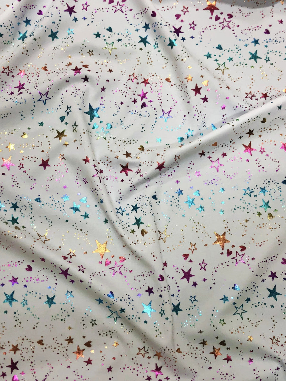 Small Multi Color Foil Stars And Hearts On White Nylon Spandex Knit Fabric - White Multi Color Foil Stars And Hearts, 58" Width
