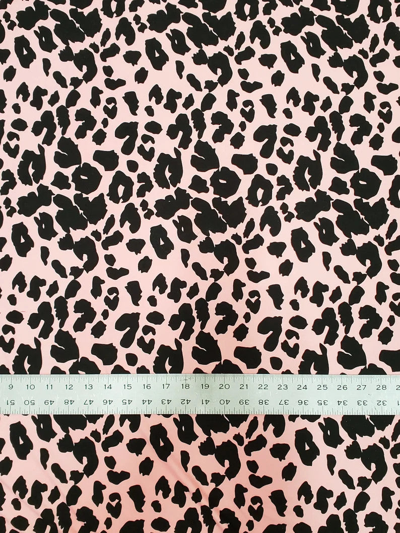 Polyester Spandex Brushed Single Span Fabric - Peach & Black Animal Print, 58" To 60" Width