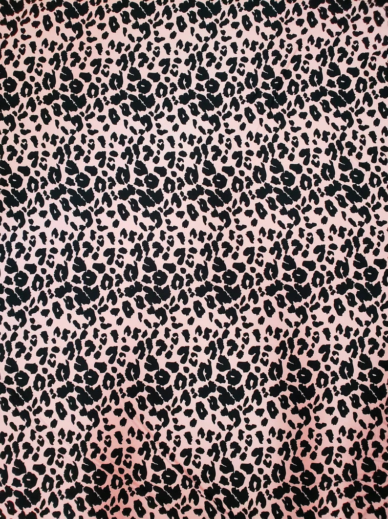 Polyester Spandex Brushed Single Span Fabric - Peach & Black Animal Print, 58" To 60" Width