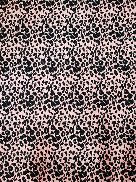 Polyester Spandex Brushed Single Span Fabric - Peach & Black Animal Print, 58" To 60" Width