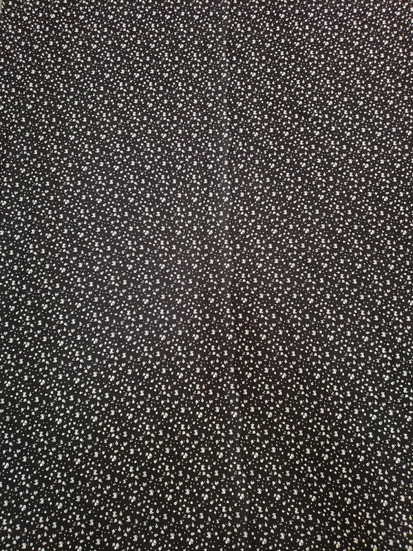 Tiny White Flowers On Black Cotton Spandex Fabric - Black With Tiny White Flowers, 58"-60" Width