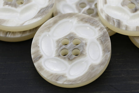 Plastic Beige Four-Hole Button