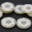 Plastic Beige Four-Hole Button