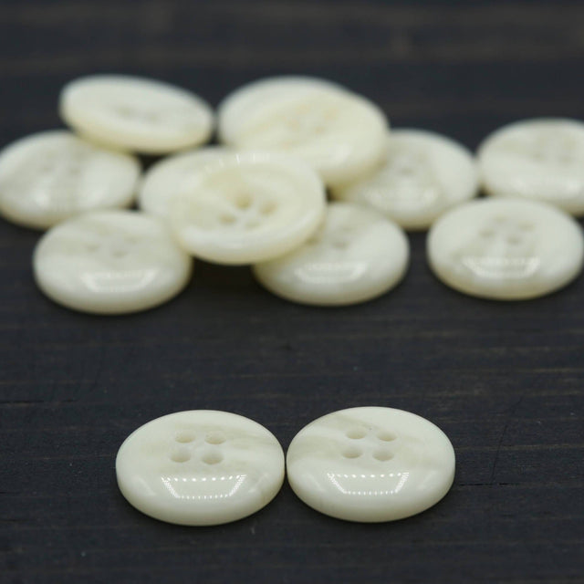 Ivory Plastic Four-Hole Button 24L