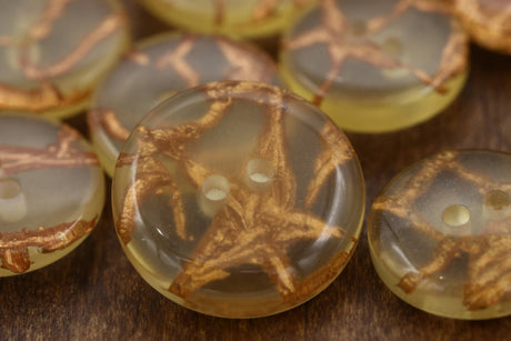 Clear Plastic Button with Gold Artistic Working
