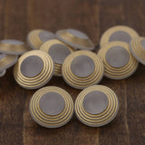 Clear Plastic Shank Button with Gold Rims