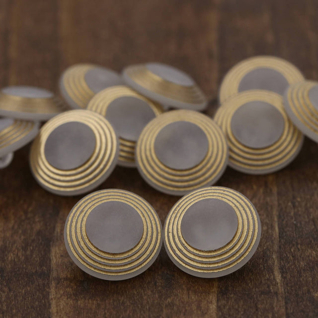 Clear Plastic Shank Button with Gold Rims