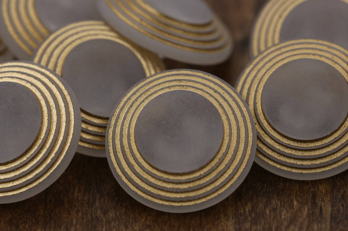 Clear Plastic Shank Button with Gold Rims
