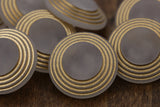 Clear Plastic Shank Button with Gold Rims