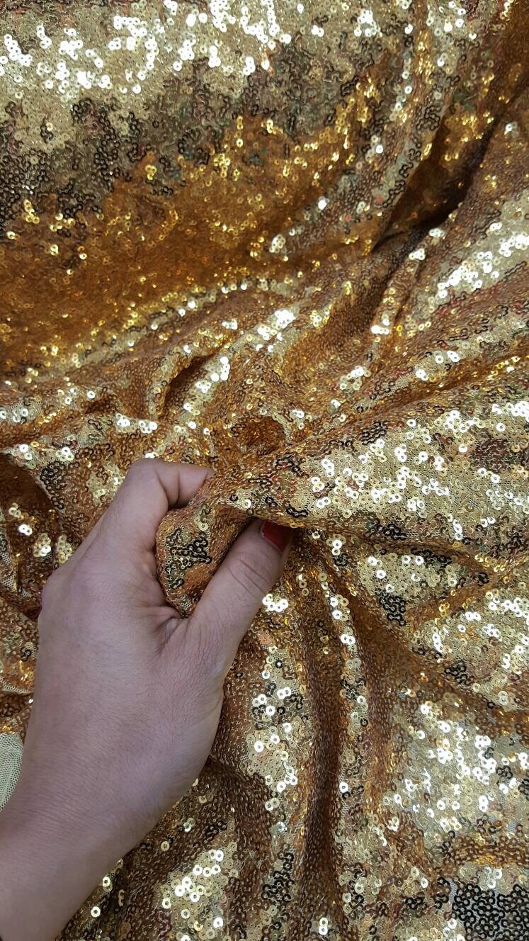 Sequin Fabric on Yellow Mesh Gold