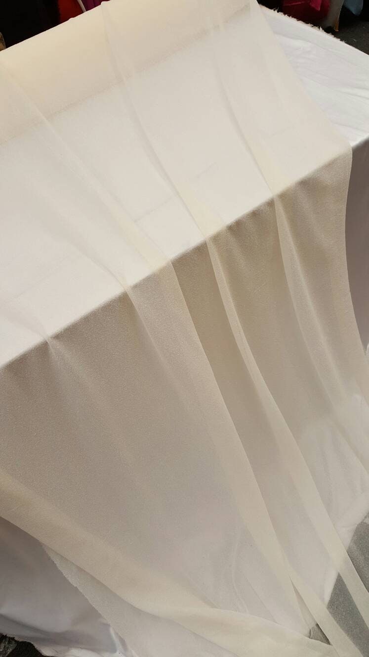 Ivory Stretch Lame Fabric