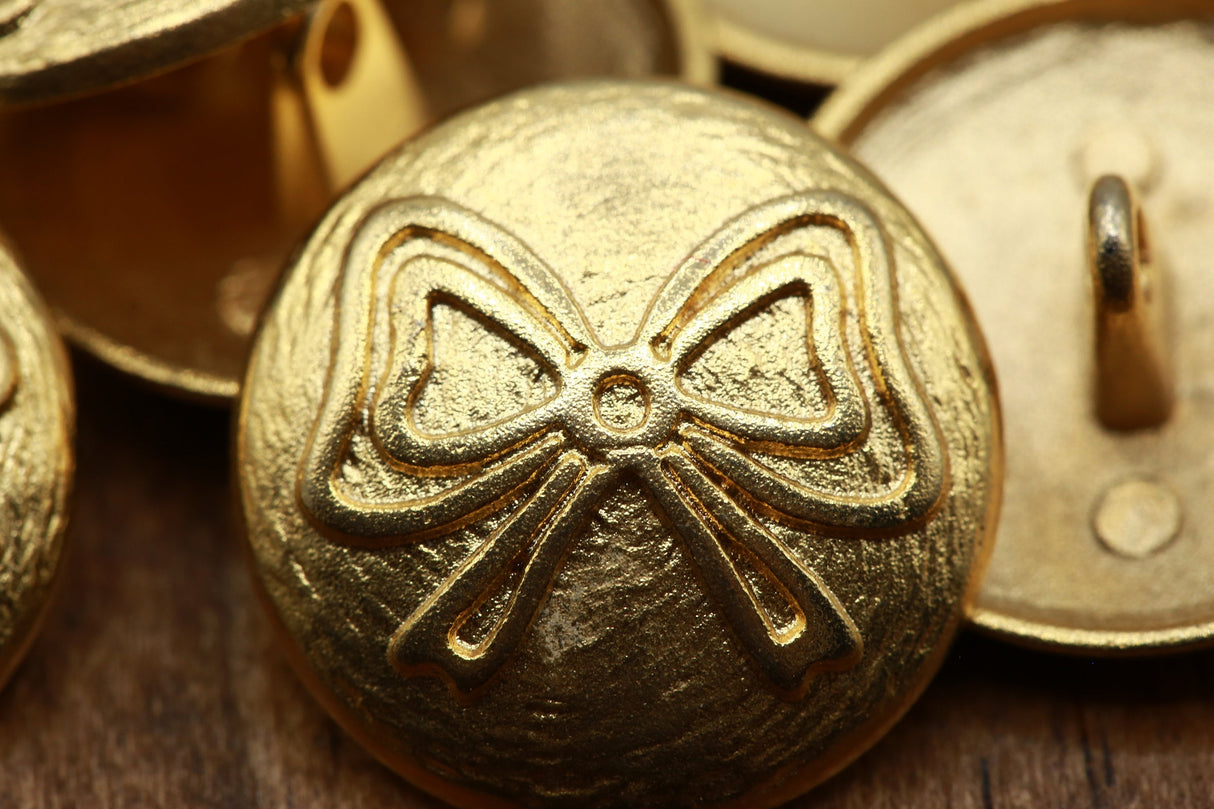 Bow Metal Button Gold 36L