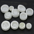 Ivory Four-Hole Crater Button