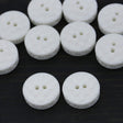Plastic Button White Texturized Checkered 34L
