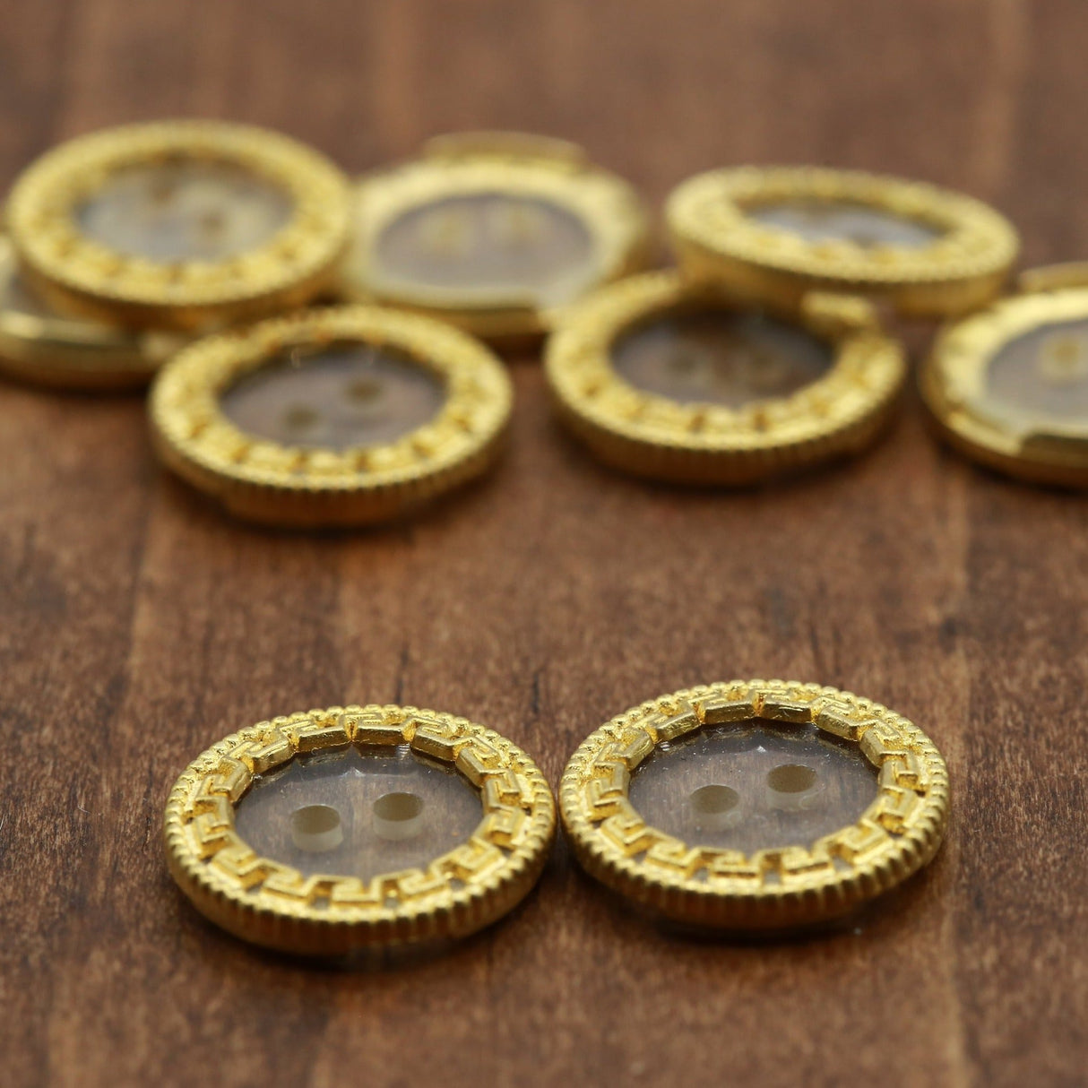 Clear Plastic Button with Gold Framing 30L
