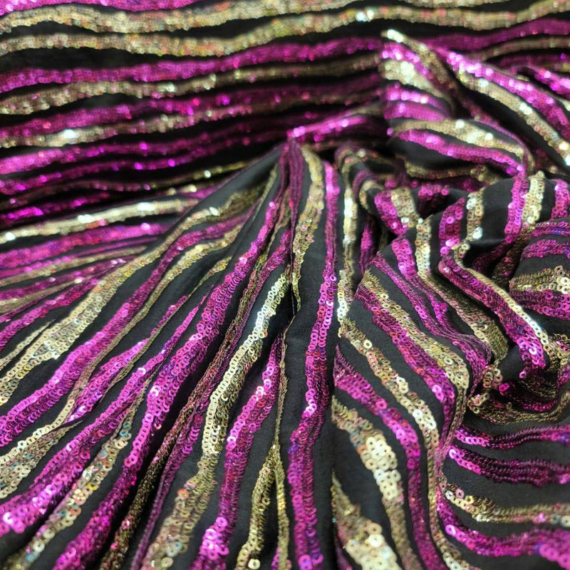 Sequin Fabric on Black Jersey Knit Gold and Fuchsia