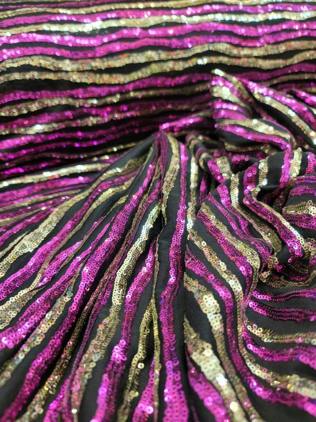Sequin Fabric on Black Jersey Knit Gold and Fuchsia