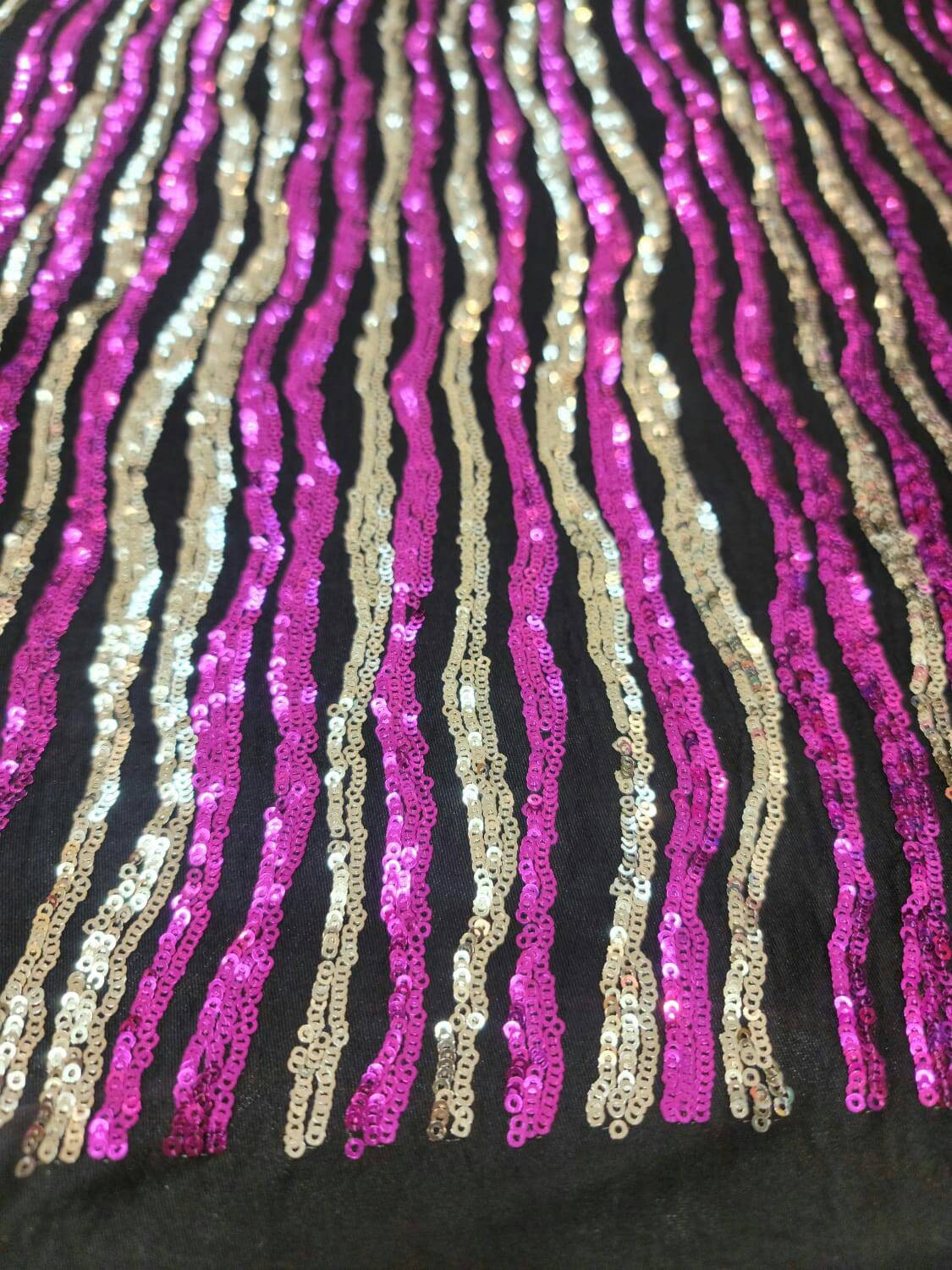 Sequin Fabric on Black Jersey Knit Gold and Fuchsia