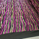 Sequin Fabric on Black Jersey Knit Gold and Fuchsia