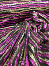 Sequin Fabric on Black Jersey Knit Gold and Fuchsia