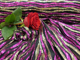 Sequin Fabric on Black Jersey Knit Gold and Fuchsia