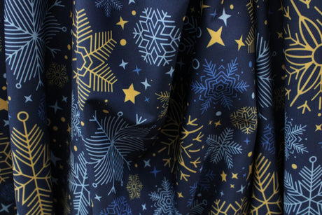 Blue And Gold Snowflakes Polyester Spandex Fabric - Blue And Gold Snowflakes, 58/60" Width (1 Yard)