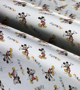 Quilting Cotton Disney Mickey Mouse Action on White