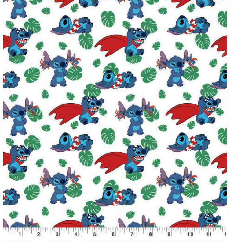 Quilting Cotton Disney Stitch Action Toss 100% Cotton Fabric