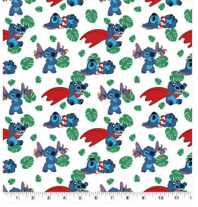 Quilting Cotton Disney Stitch Action Toss 100% Cotton Fabric