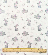 Quilting Cotton Hopping Bunnies on Cream Nursery Robert Kaufman