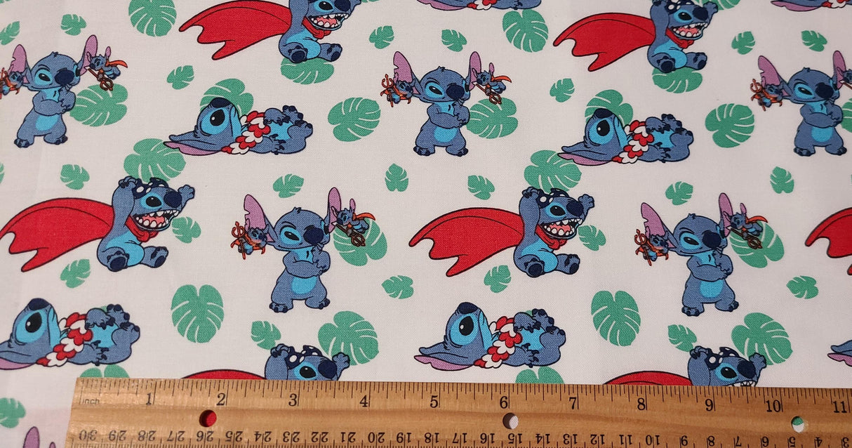 Quilting Cotton Disney Stitch Action Toss 100% Cotton Fabric